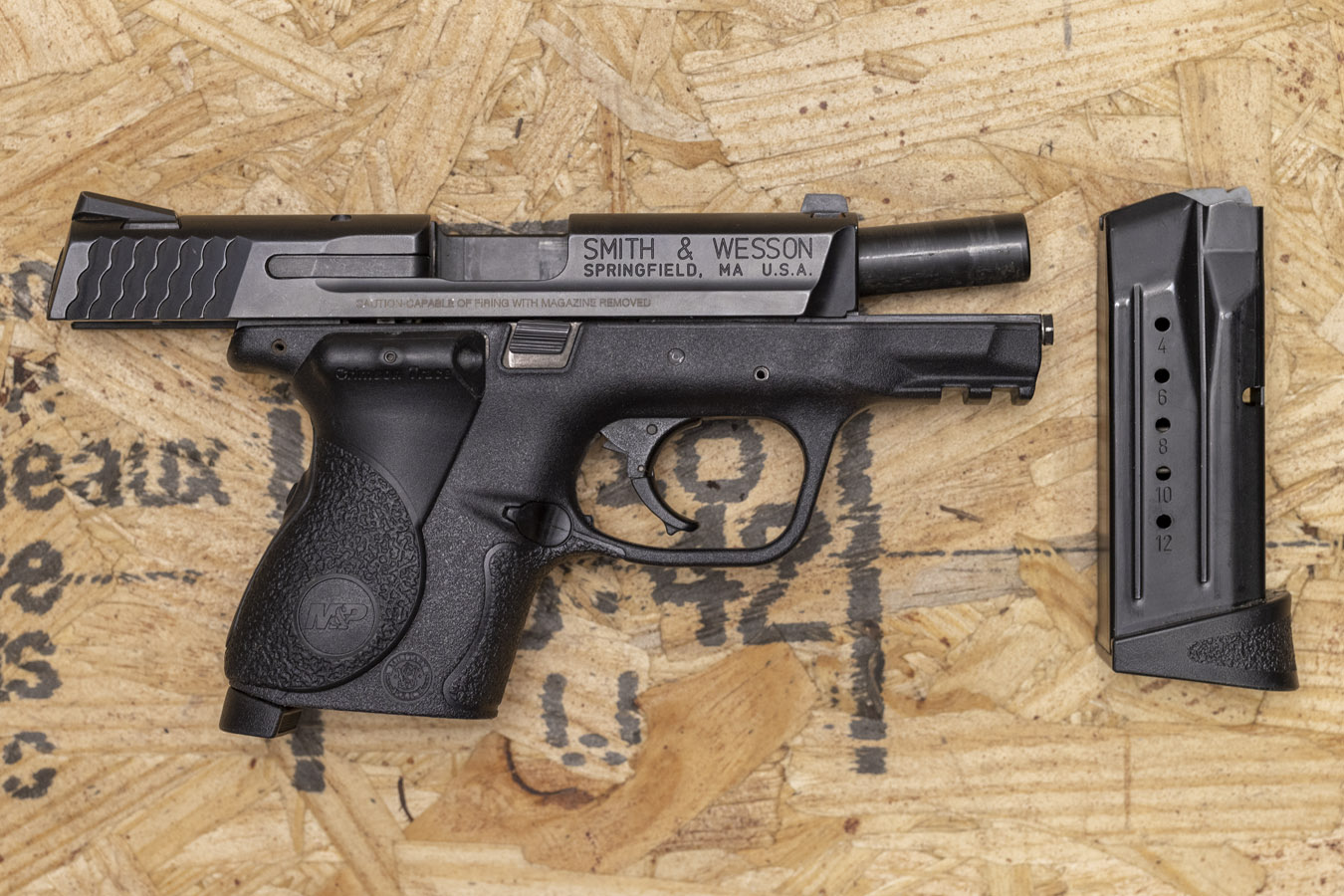 SMITH AND WESSON MP 9C 9MM POLICE TRADE-IN PISTOL WITH GRIP LASER