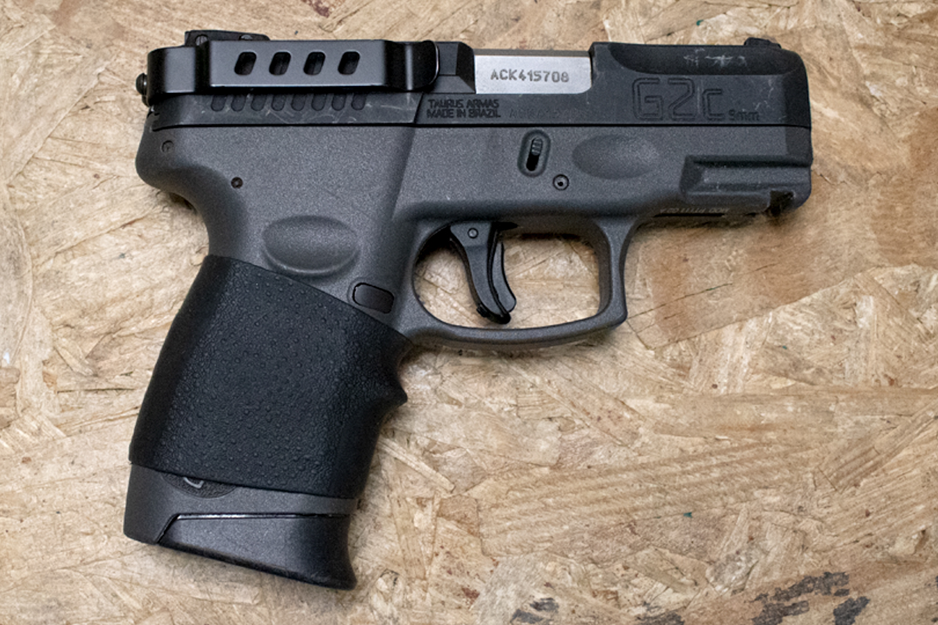 Taurus G2C 9mm Police Trade-In Pistol with Rubber Grip Sleeve and Belt Clip