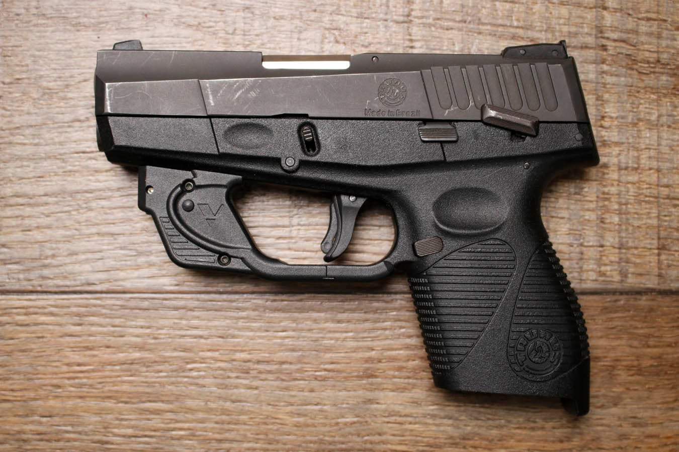 Taurus PT709 Slim 9mm Police Trade-In Pistol with Laser (No Magazine)