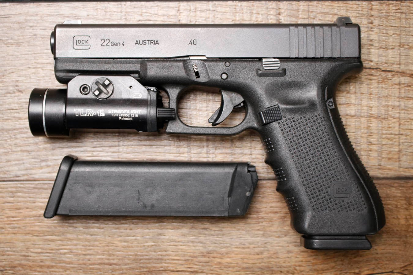 Glock 22 Gen 4 40 S&W Police Trade-In Pistol with TLR-1S Light