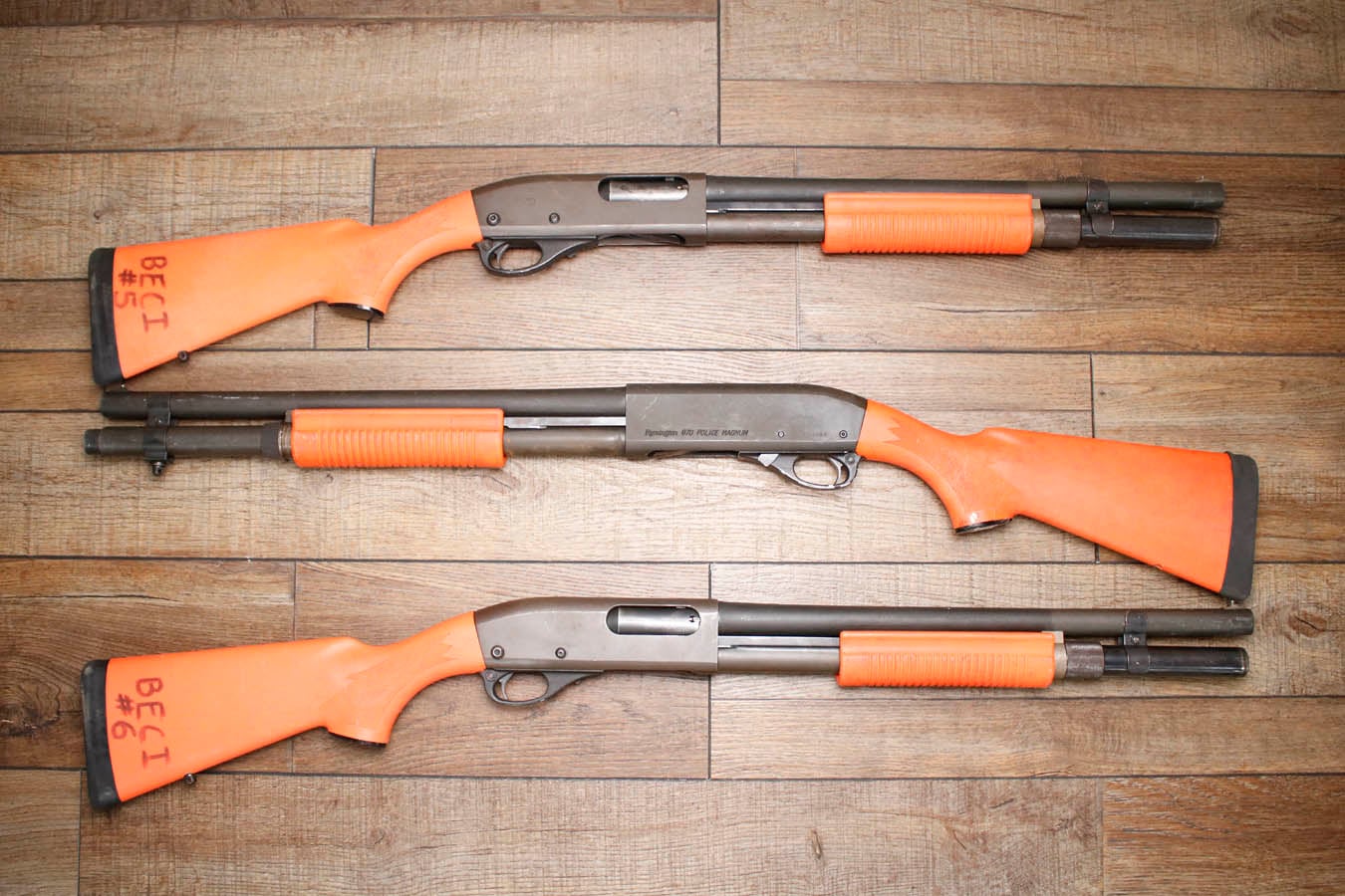 Remington 870 Police Magnum 12GA Police Trade-In Shotgun with Synthetic Orange Furniture and Extended Tube Mag