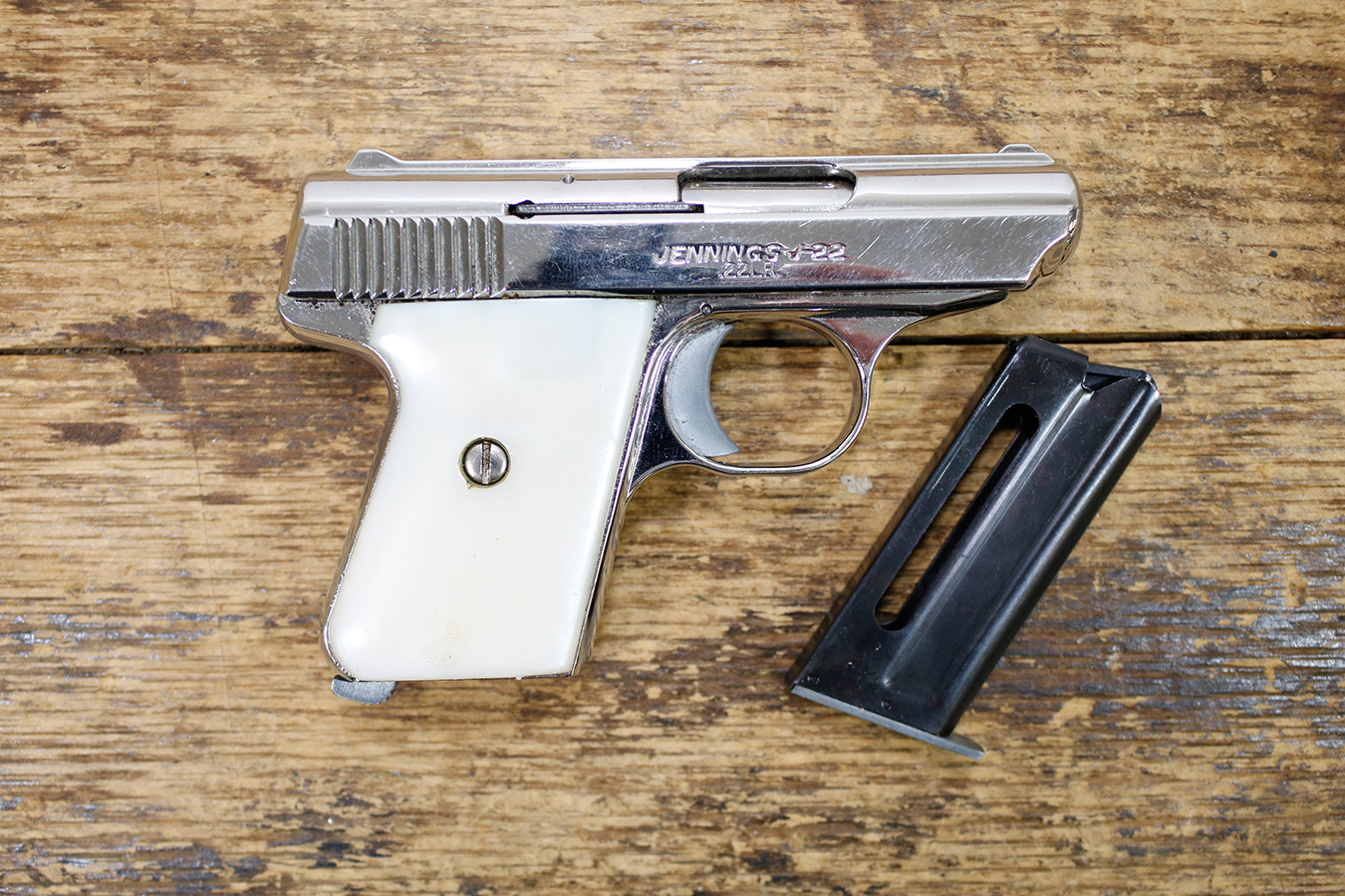 BRYCO J-22 22 LR POLICE TRADE-IN PISTOL WHITE GRIPS