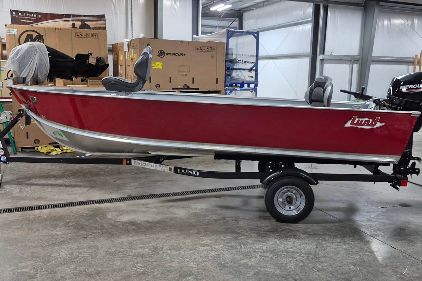 Lund 2025 1600 Fury Tiller Heritage Edition with Mercury 25 ELHPT Motor and Shorelander Trailer