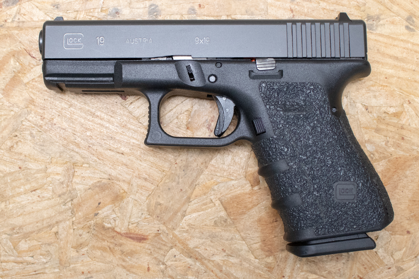 GLOCK 19 9mm Police Trade-In Pistol with Enhanced Grips, Slide Graphic