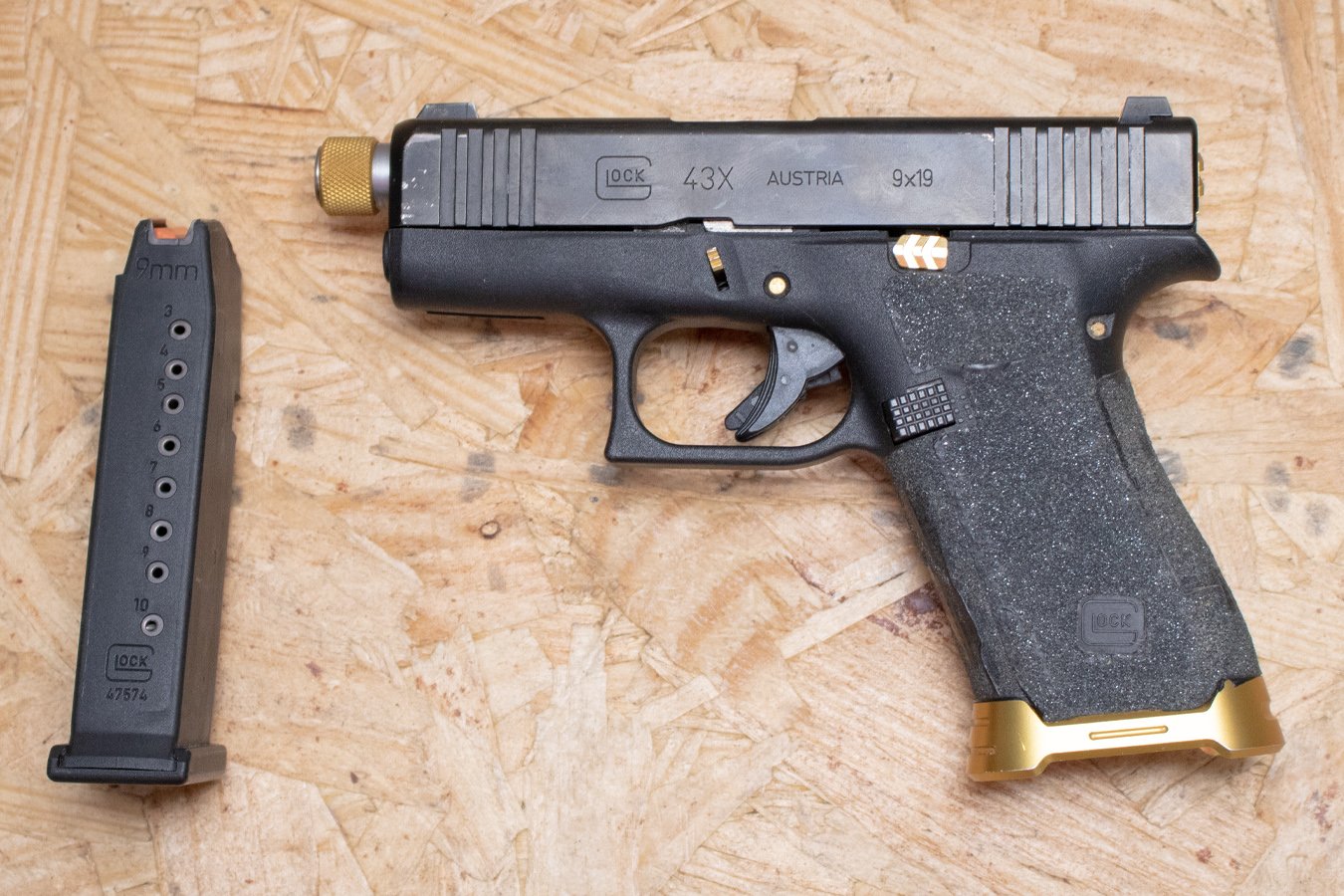 GLOCK 43X 9mm Police Trade-In Pistol with Gold-Colored Accents and Zaffiri Precision Threaded Barrel