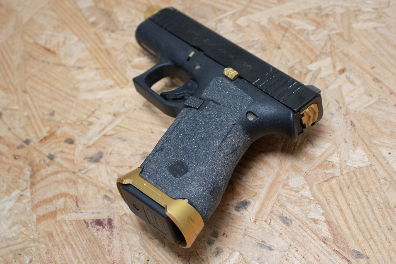 GLOCK 43X 9mm Police Trade-In Pistol with Gold-Colored Accents and Zaffiri Precision Threaded Barrel