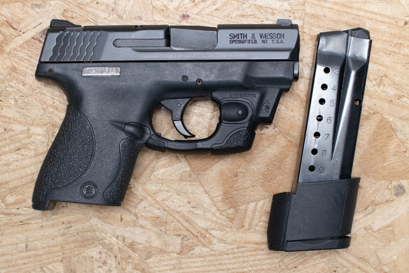 SMITH AND WESSON M&P9 Shield 9mm Police Trade-In Pistol with Extended Magazine and Laser