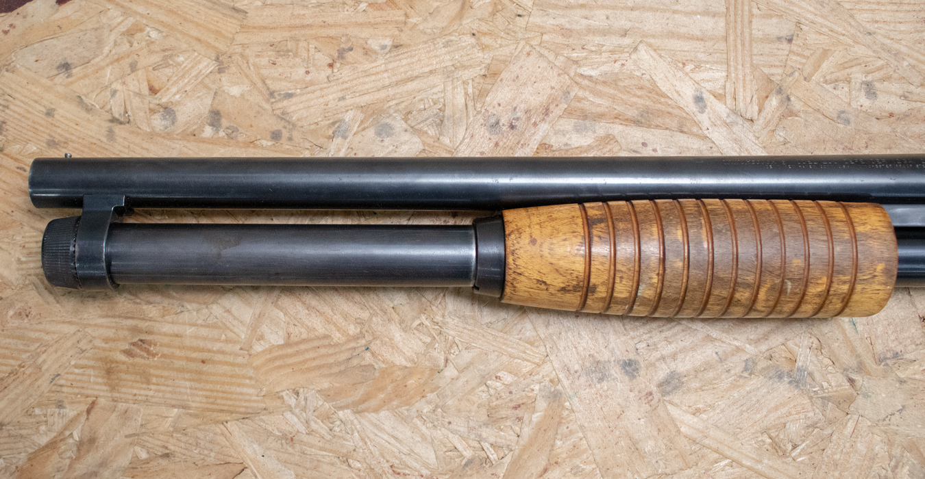 WINCHESTER FIREARMS 1200 Defender 12 Gauge Police Trade-In Shotgun with Wood Stock