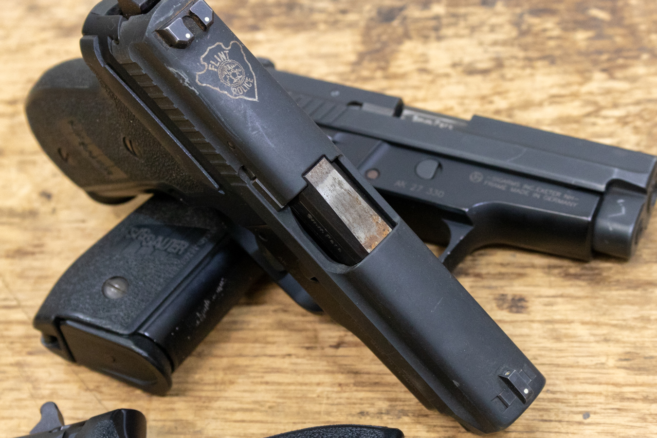 SIG SAUER P229 9mm DAO Police Trade-ins with Flint MI Police Dept Stamp (Good Condition)