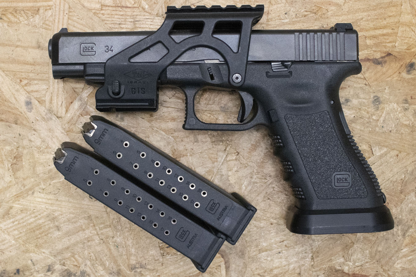 GLOCK 34 9mm Police Trade-In Pistol with Three Magazines, Optic Mount, and Flared Magwell