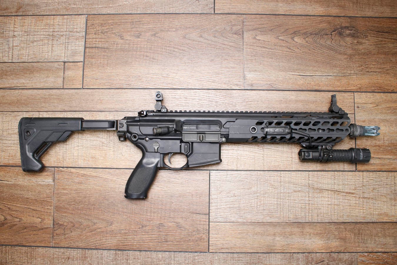 SIG SAUER SIG MCX 5.56mm Police Trade-In NFA Short Barrel Rifle with Folding Stock and Flashlight (No Magazine)