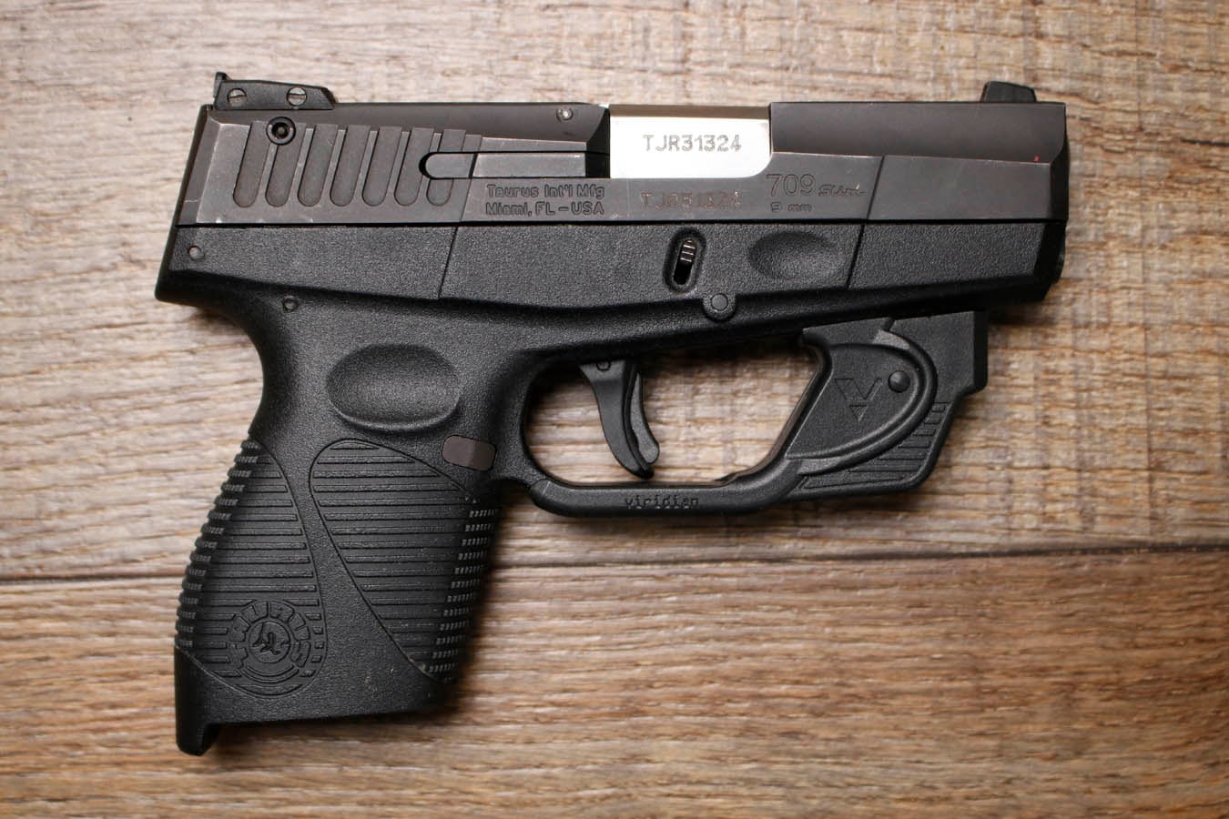 TAURUS PT709 Slim 9mm Police Trade-In Pistol with Laser (No Magazine)