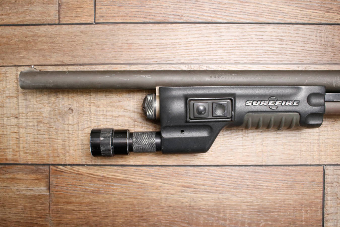 REMINGTON Police Magnum 12GA Police Trade-In Shotgun with SureFire Flashlight