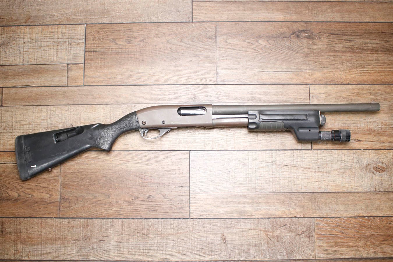 REMINGTON Police Magnum 12GA Police Trade-In Shotgun with SureFire Flashlight