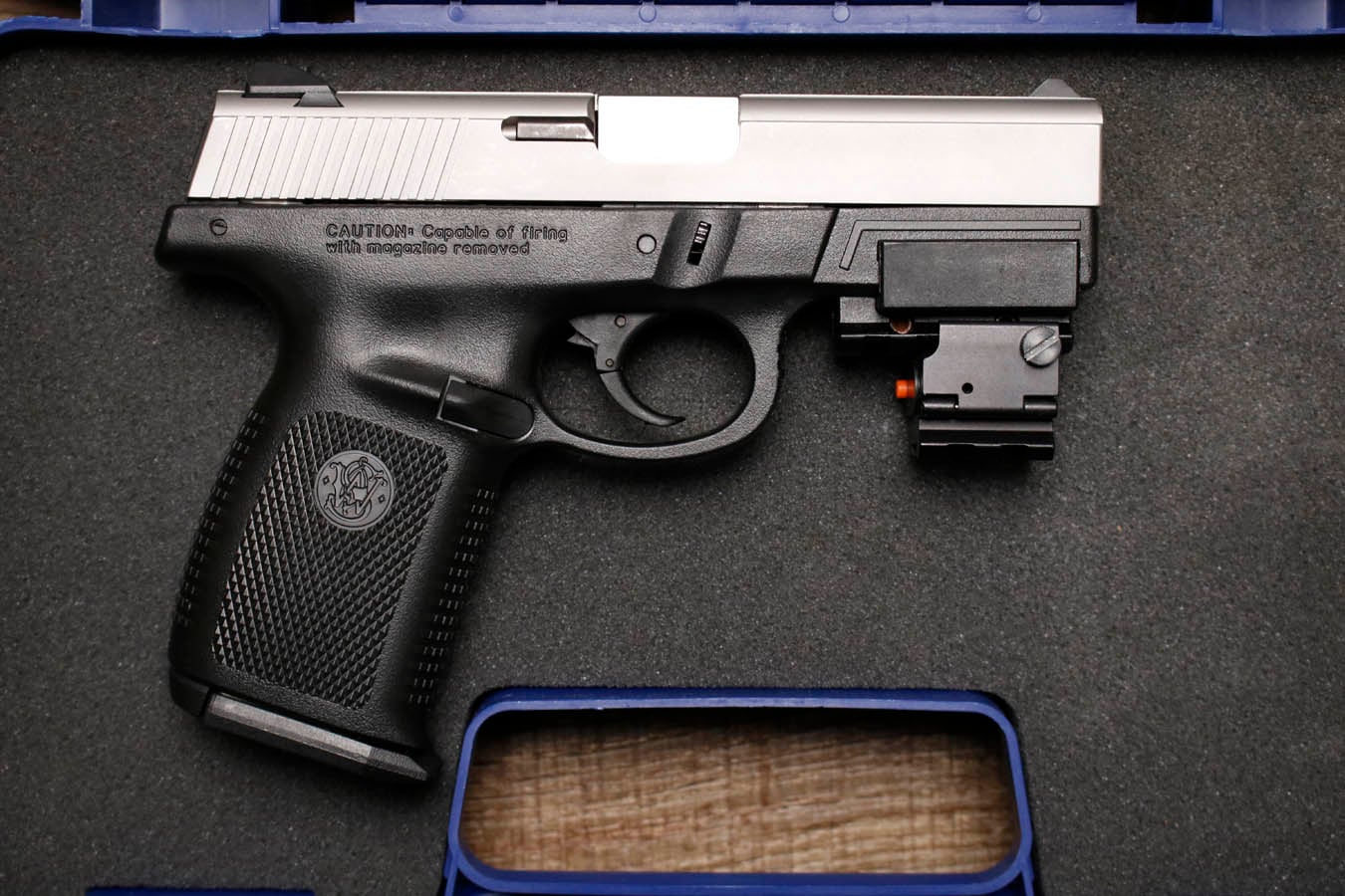 SMITH AND WESSON SW9VE 9mm Police Trade-In Pistol with Laser and Two Magazines