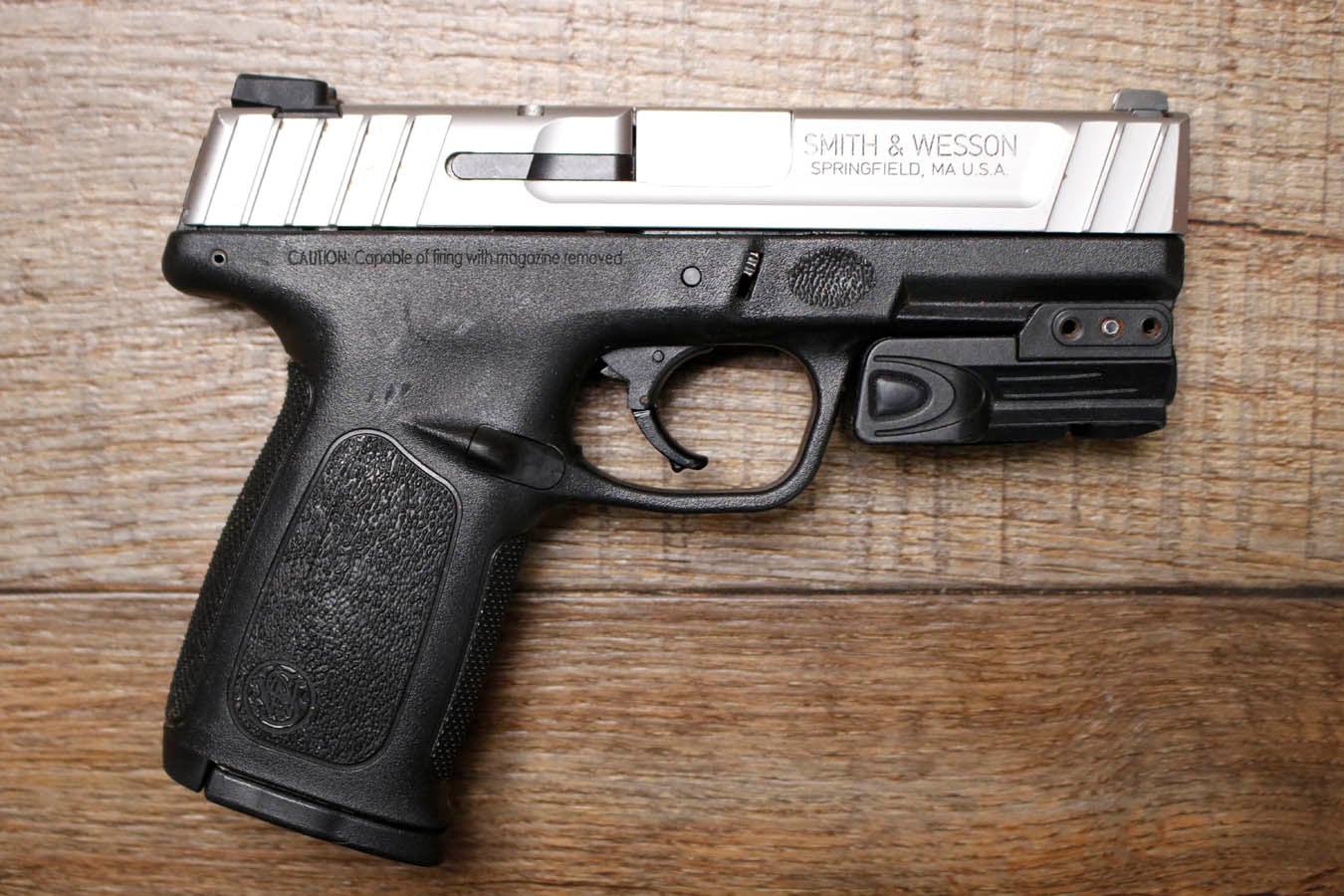 SMITH AND WESSON SD40VE 40 S&W Police Trade-In Pistol with Four Magazines