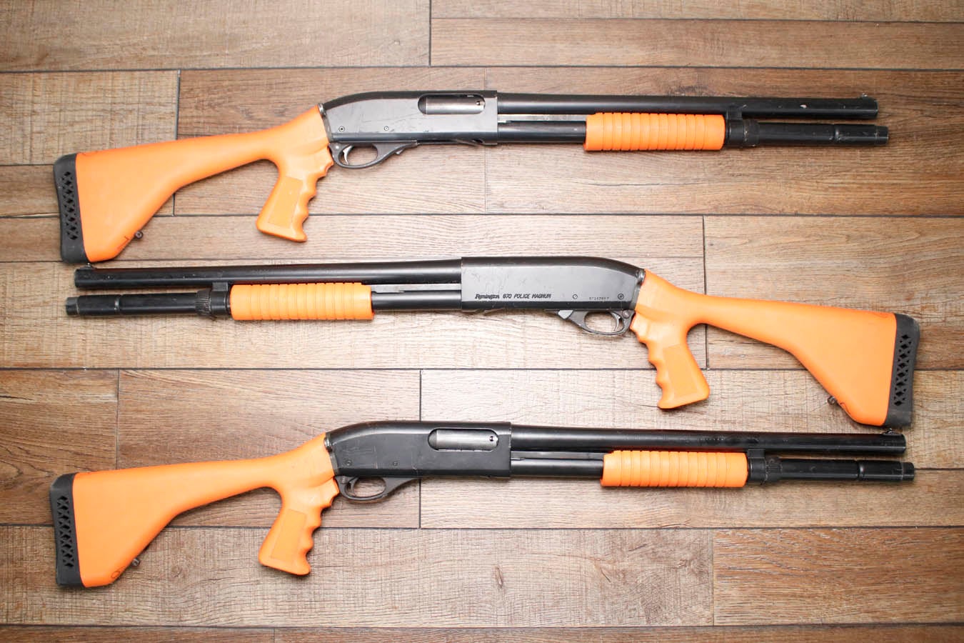 REMINGTON 870 Police Magnum 12GA Police Trade-In Shotgun with Synthetic Orange Furniture18 Inch Barrel and Extended Mag Tube