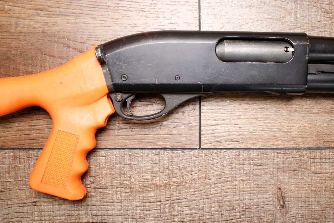 REMINGTON 870 Police Magnum 12GA Police Trade-In Shotgun with Synthetic Orange Furniture18 Inch Barrel and Extended Mag Tube