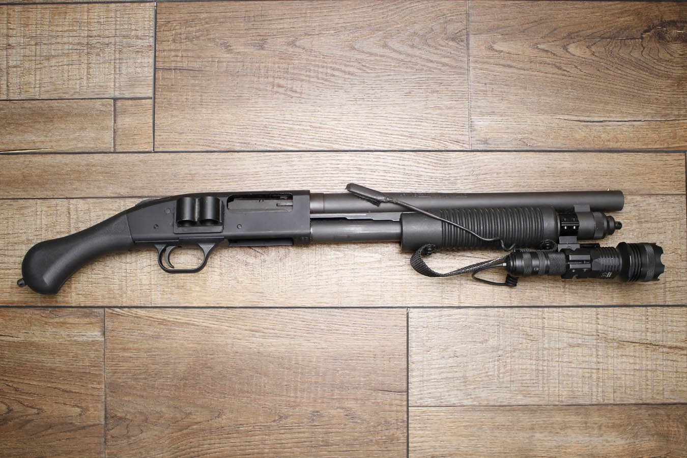 MOSSBERG 590 Shockwave 12GA Police Trade-In Shotgun with Flashlight